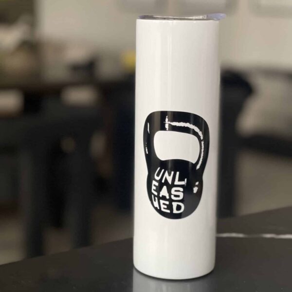 An Unleashed Health and Fitness branded insulated tumbler.